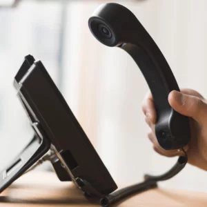 Businessman holding headset